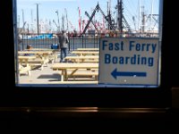 1008280152 ma nb NantucketFerry  Passengers wait to board the maiden voyage of the Seastreak Whaling City Express ferry service from New Bedford to Nantucket.   PETER PEREIRA/THE STANDARD-TIMES/SCMG : ferry, waterfront, voyage, trip, harbor